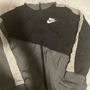 Black and grey nike zip up jacket